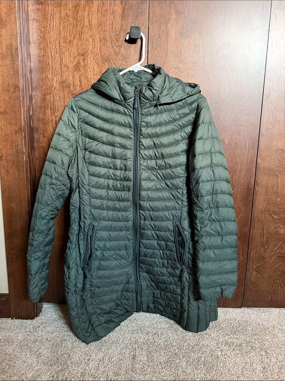 Womanโs Long puffer jacket